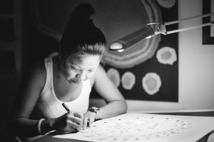 Jacky Cheng at work in her studio in Broome, Australia