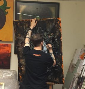 el bastardo working on his art