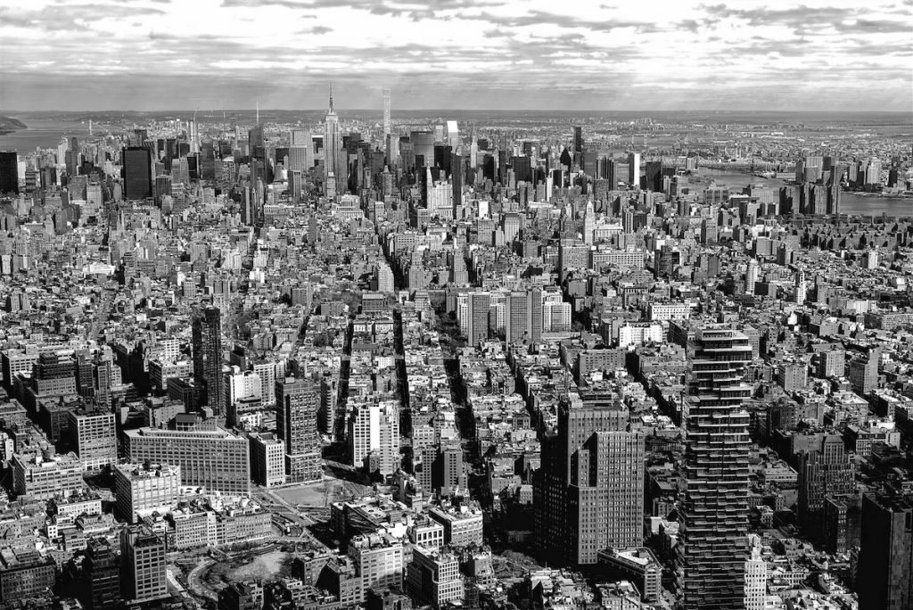 A black and white photo of a city skyline